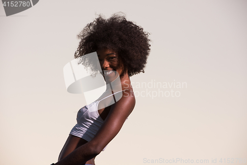 Image of young black woman in nature