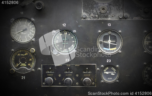 Image of Different meters and displays in an old plane