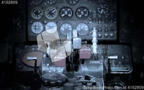 Image of Center console and throttles in airplane