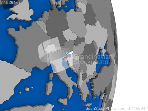 Image of Slovenia on globe with flag