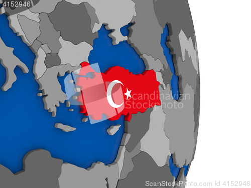 Image of Turkey on globe with flag