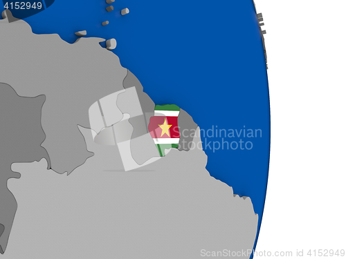 Image of Suriname on globe with flag