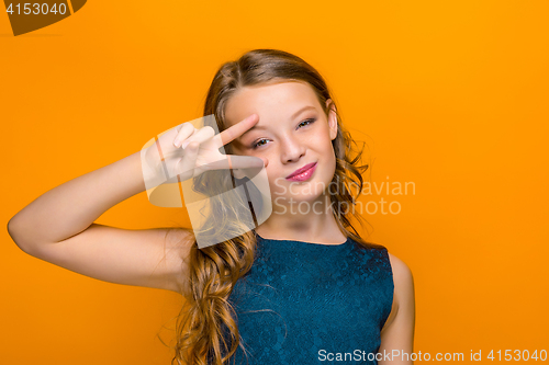 Image of The face of playful happy teen girl