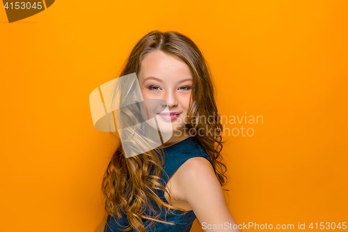 Image of The face of playful happy teen girl