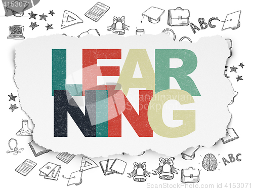 Image of Education concept: Learning on Torn Paper background