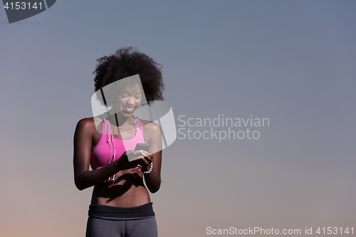 Image of young african american woman in nature