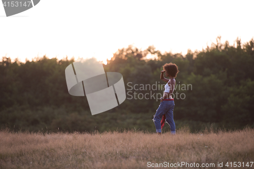 Image of young black woman in nature