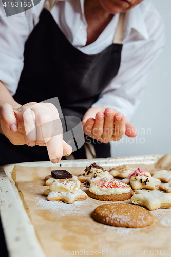 Image of Person finishing homemade cookies