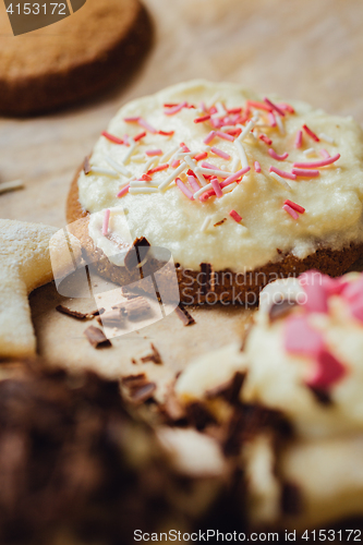 Image of Appetizing homemade cookie with pink topping