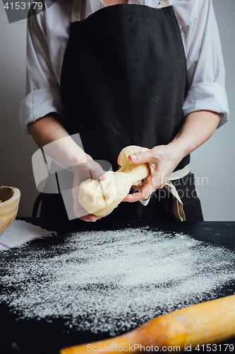 Image of Person making a cookie dough