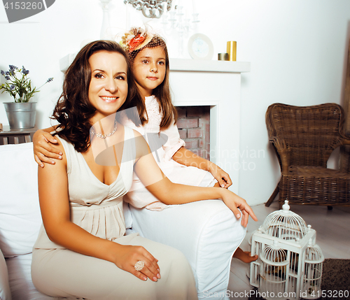 Image of happy smiling mother with little cute daughter at home interior, lifestyle people concept