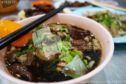 Image of Penang duck kway chap, noodle rolls in soup