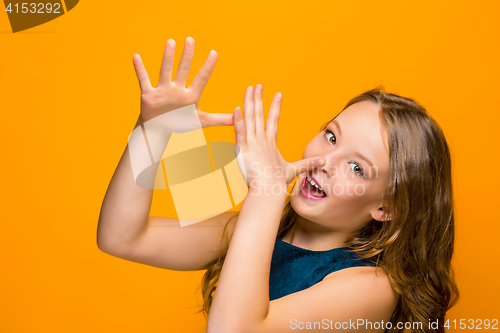 Image of The face of playful happy teen girl