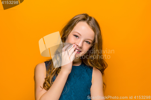 Image of The face of playful happy teen girl