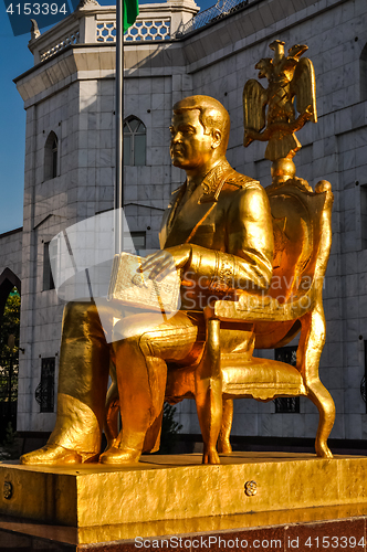 Image of Golden man with book