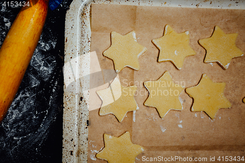 Image of Star-shaped cookies on a baking pan