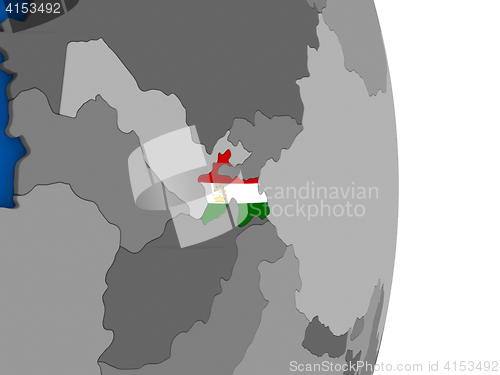 Image of Tajikistan on globe with flag