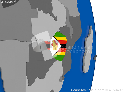 Image of Zimbabwe on globe with flag