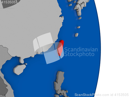 Image of Taiwan on globe with flag