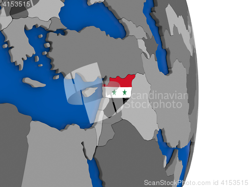 Image of Syria on globe with flag