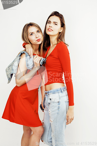 Image of best friends teenage girls together having fun, posing emotional on white background, besties happy smiling, lifestyle people concept