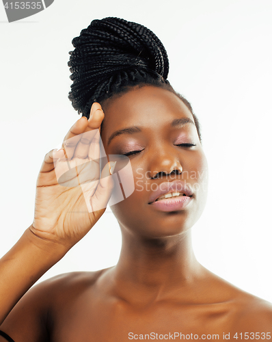 Image of young pretty african american woman naked taking care of her skin isolated on white background, healthcare people concept