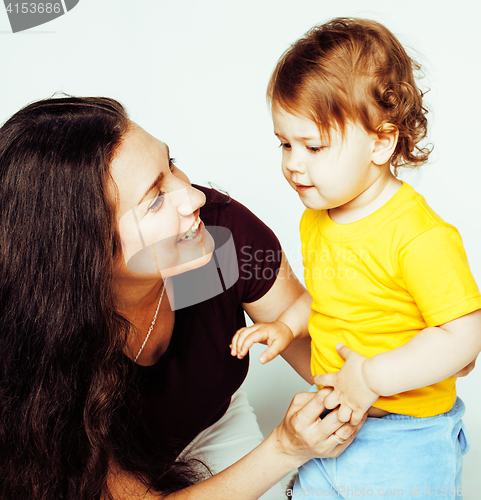 Image of pretty real normal mother with cute blond little daughter close up isolated on white background, lifestyle people concept