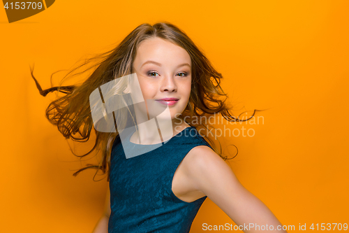 Image of The face of playful happy teen girl