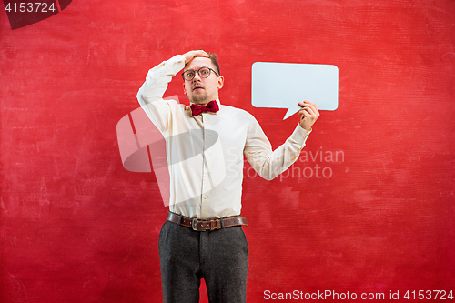 Image of Young funny man with empty blank sign