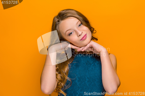 Image of The face of playful happy teen girl