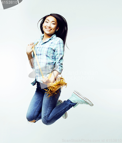 Image of young pretty jumping asian woman posing cheerful emotional isolated on white background, lifestyle people concept