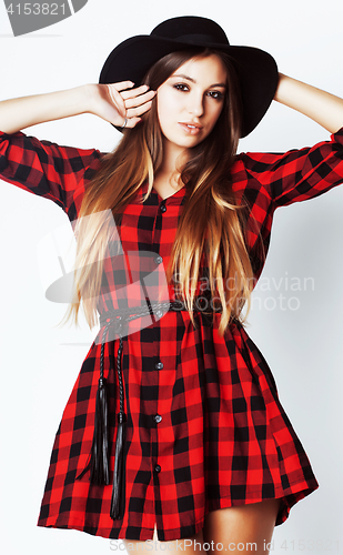 Image of young pretty brunette girl hipster in hat on white background casual close up dreaming smiling. real american woman, lifestyle people concept