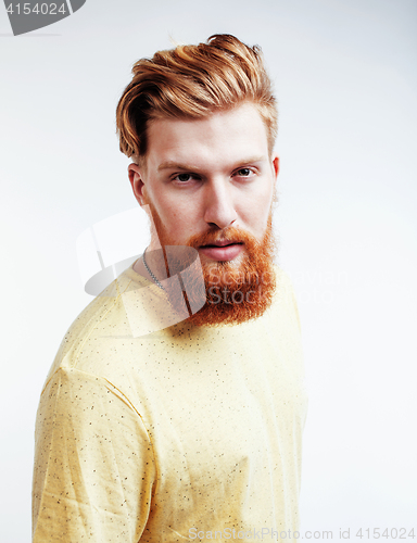 Image of young handsome hipster ginger bearded guy looking brutal isolated on white background, lifestyle people concept