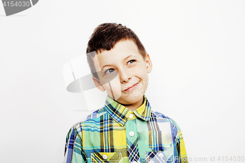 Image of young pretty little boy kid wondering, posing emotional face isolated on white background, gesture happy smiling close up, lifestyle people concept