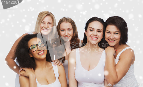 Image of group of happy different women in white underwear