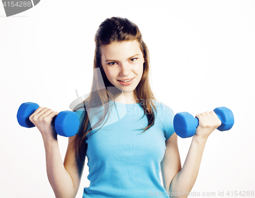 Image of young pretty slim woman with dumbbell isolated cheerful smiling, real sport girl next door, lifestyle people concept