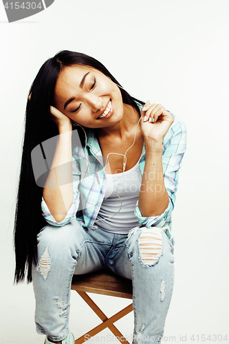 Image of young pretty asian woman posing cheerful emotional isolated on white background, lifestyle people concept