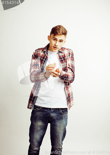 Image of young handsome teenage hipster guy posing emotional, happy smiling against white background isolated, lifestyle people concept