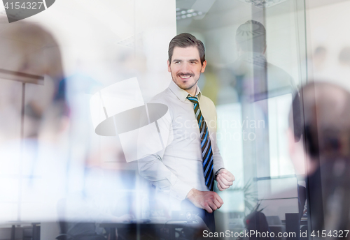 Image of Relaxed informal business team office meeting.