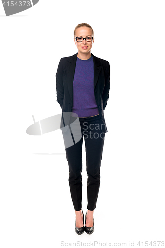 Image of Business woman standing with arms crossed against white background..