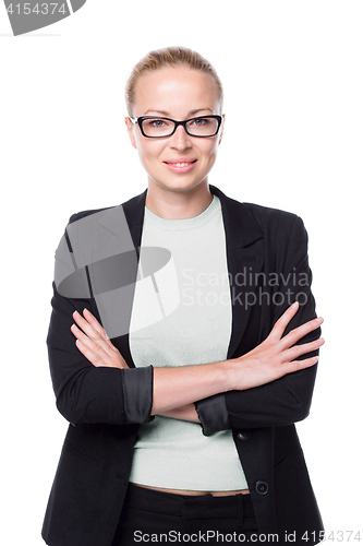 Image of Business woman standing with arms crossed against white background..