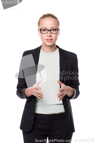 Image of Business woman standing with arms crossed against white background..