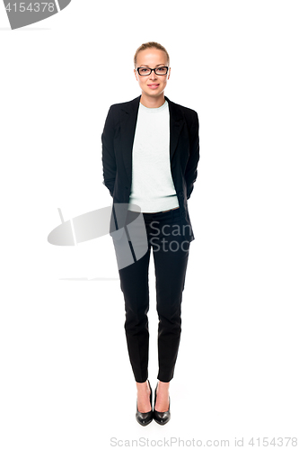 Image of Business woman standing with arms crossed against white background..