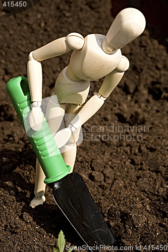 Image of Mannequin digging