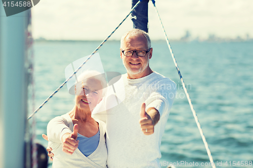 Image of senior couple sailing on sea boat or yacht