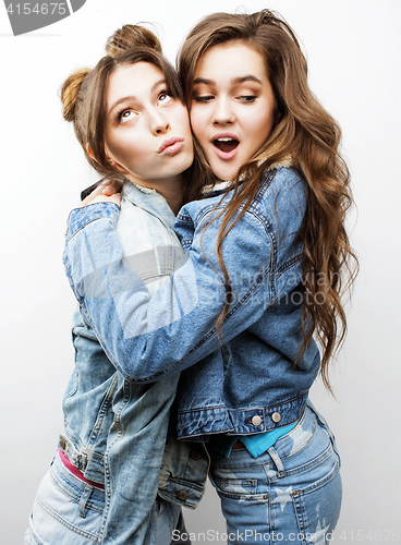 Image of lifestyle and people concept: Fashion portrait of two stylish sexy girls best friends, over white background. Happy time for fun.