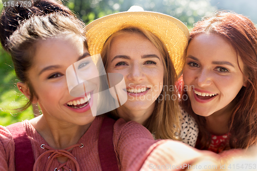 Image of happy women or friends taking selfie at summer