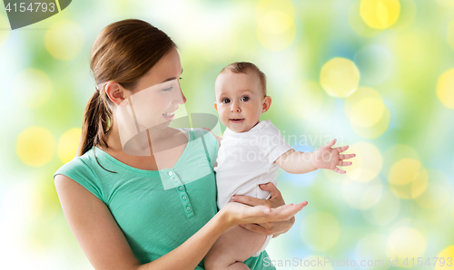 Image of happy young mother with little baby