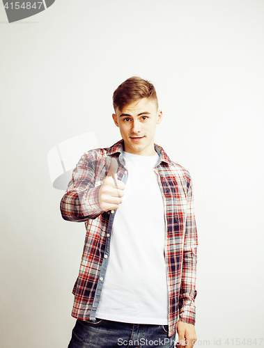 Image of young handsome teenage hipster guy posing emotional, happy smiling against white background isolated, lifestyle people concept