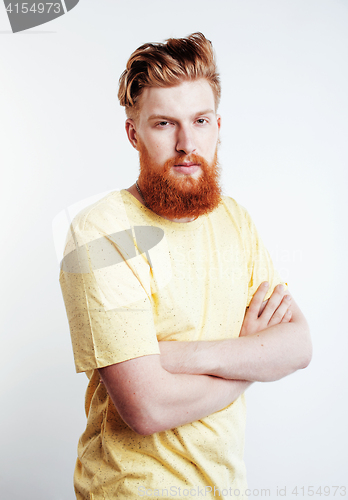 Image of young handsome hipster ginger bearded guy looking brutal isolated on white background, lifestyle people concept